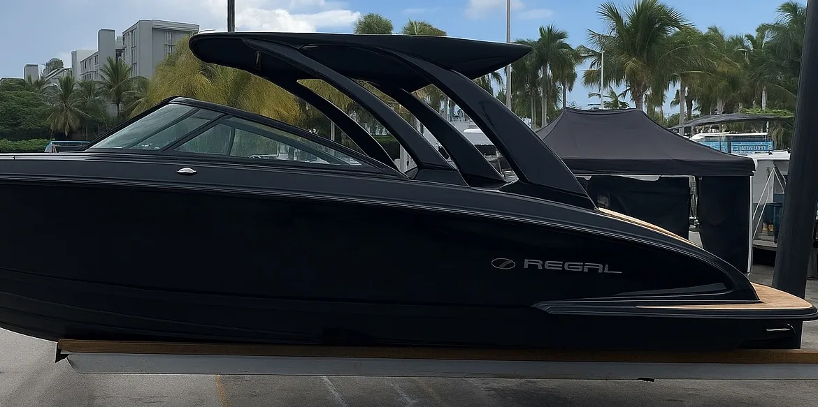 Regal bowrider refinished in gloss black marine wrap