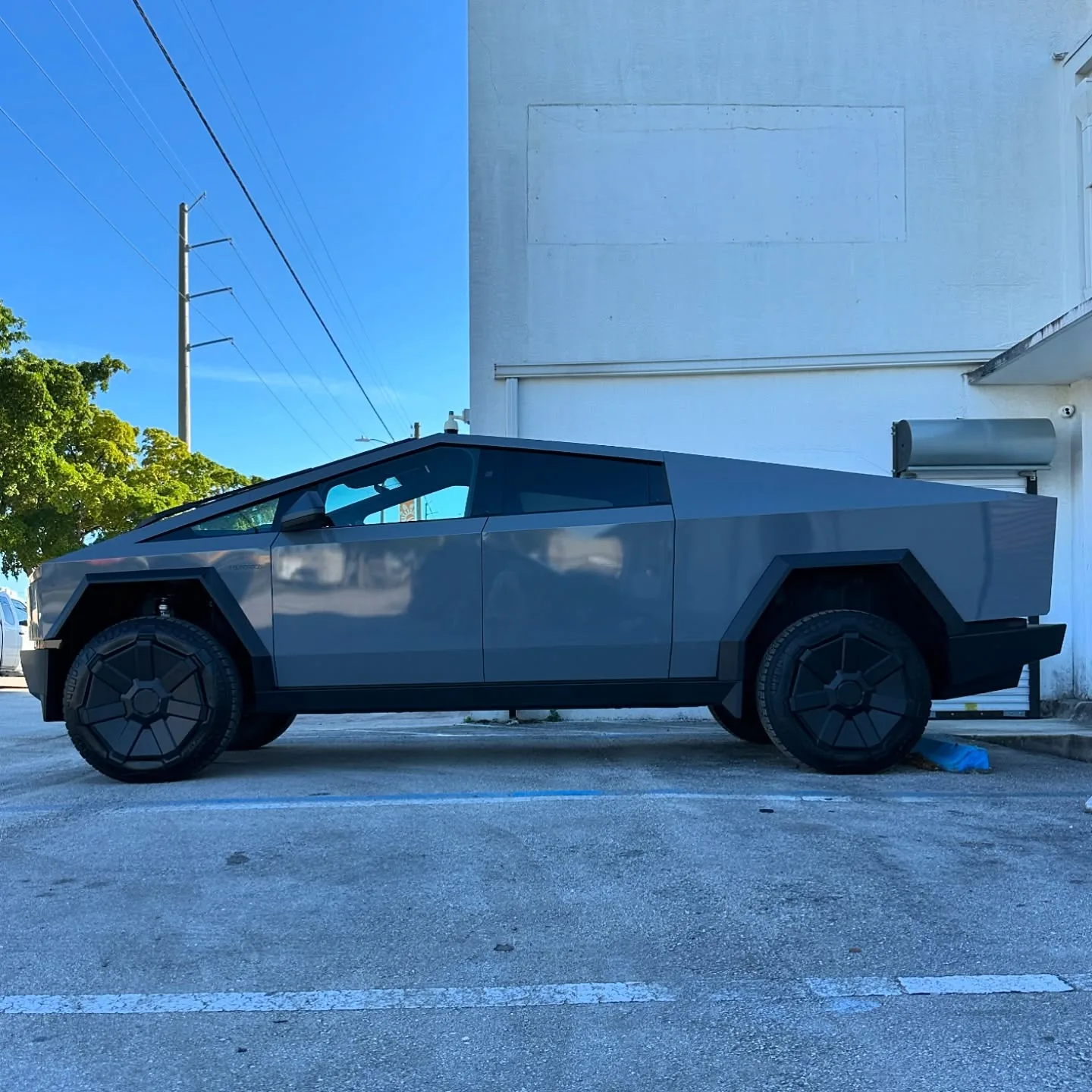 Tesla Cybertruck side profile after a full wrap at Wrap Trap in Hollywood, FL